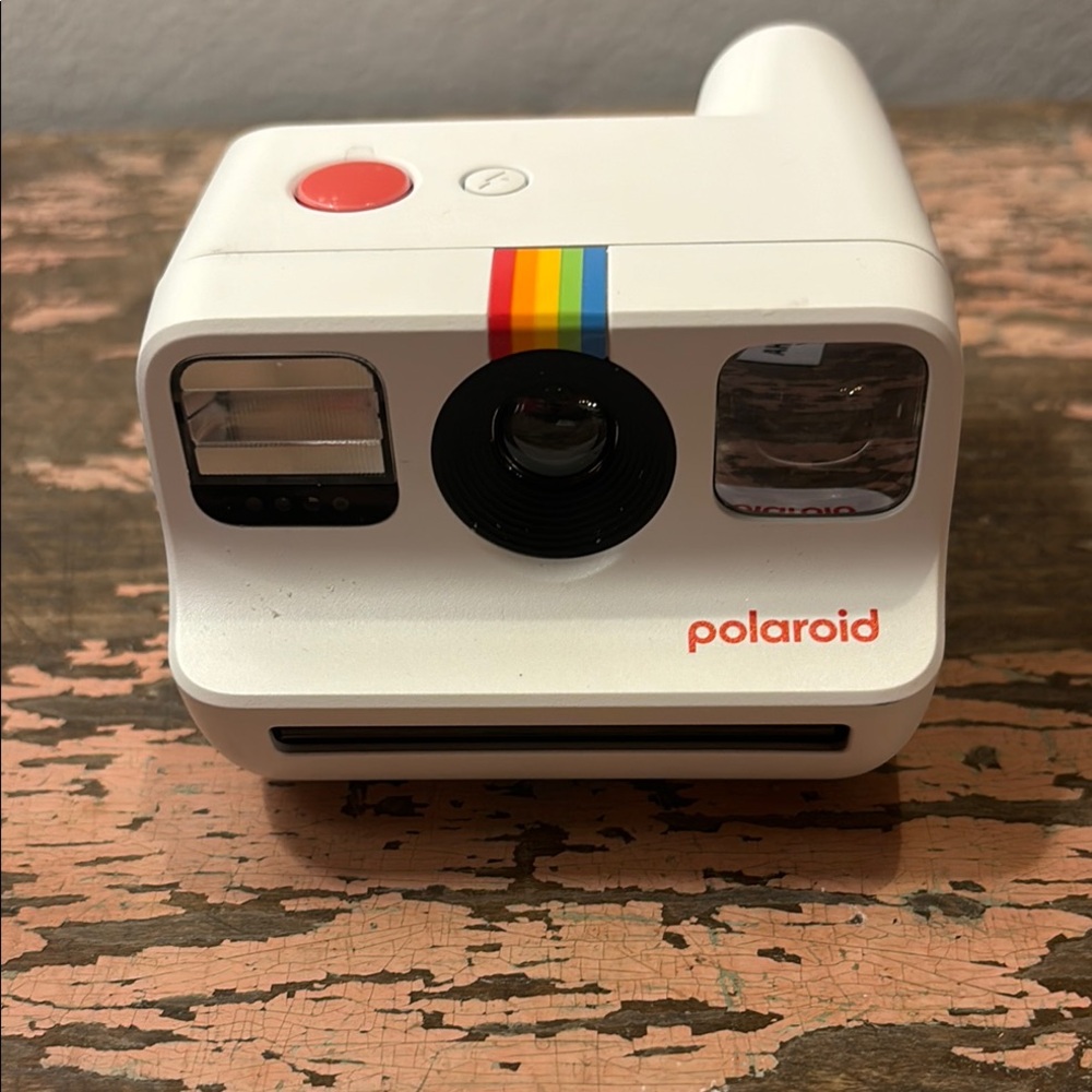 Polaroid go Compact White Simulated Camera with Rainbow Stripe and Circular Lens
